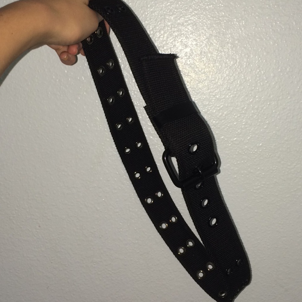 Black grommet belt